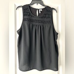 Flowy black sleeveless top